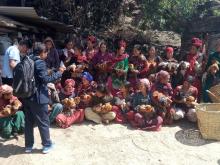 women with chicken on their hand and other officers